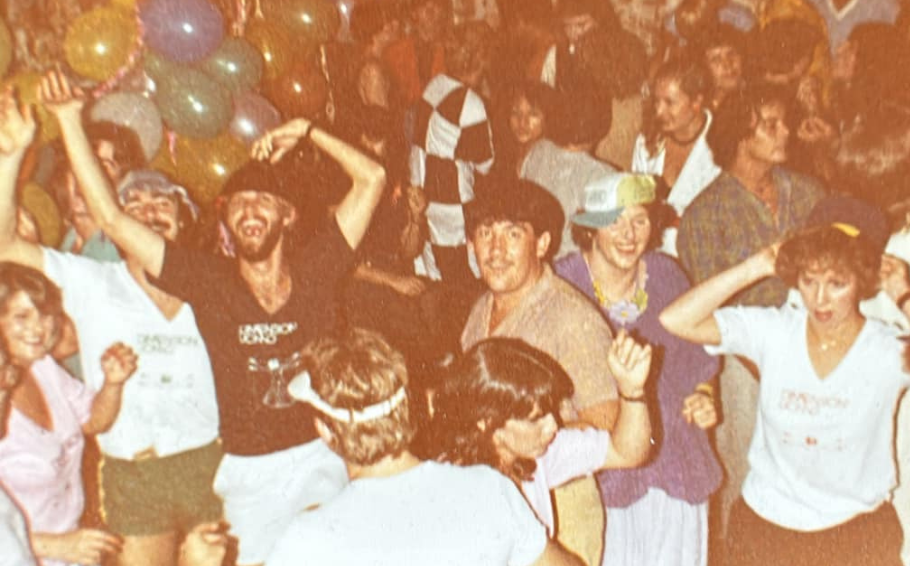 Patrons of the gay bar and venue from Brisabne Old Rowes from the 70s party the night away in 70s attire.